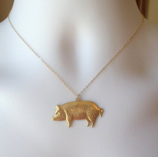 Set of 17 Gold Pig Necklaces